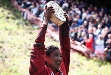 Conquering the Hill: Abby Lampe's Journey to Cheese-Rolling Glory