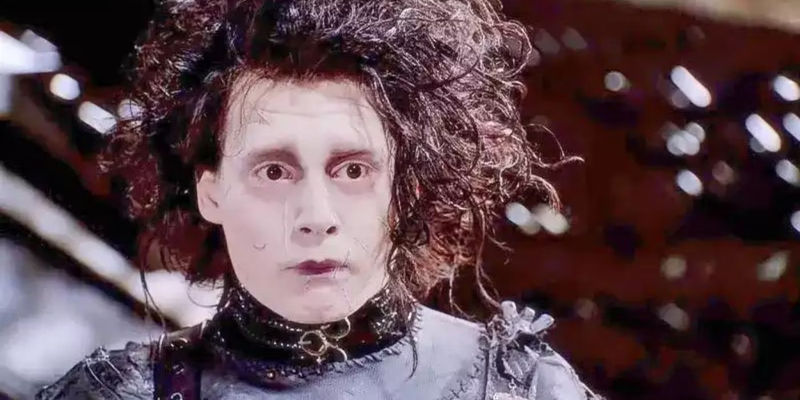 Edward struggles to express himself while inside The Inventor's mansion in Edward Scissorhands
