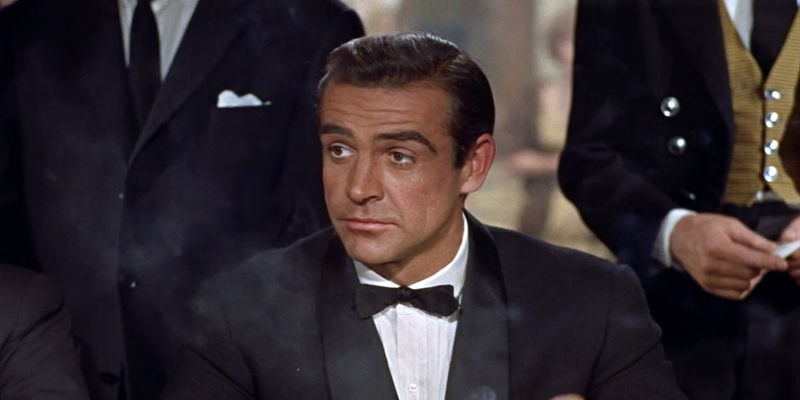 Sean Conner's James Bond sitting at a card game in Dr. No.