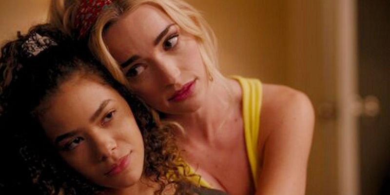 Ginny (Antonia Gentry) and Georgia (Brianne Howey) hugging in Ginny & Georgia.