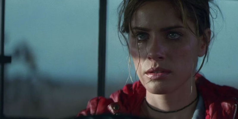 Amanda Peet with tears in her eyes in Identity