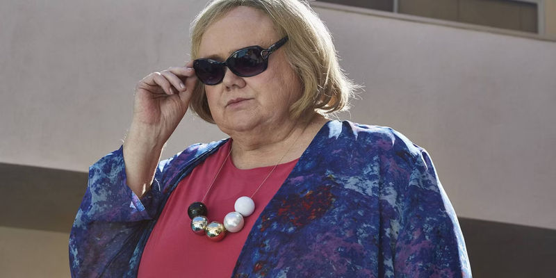 Louie Anderson as Christine Baskets taking off her sunglasses in Baskets.