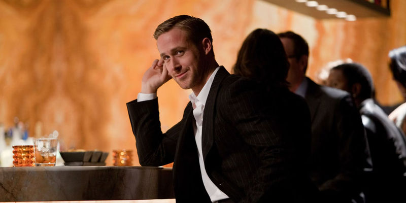 Ryan Gosling smiling at the bar in Crazy, Stupid, Love