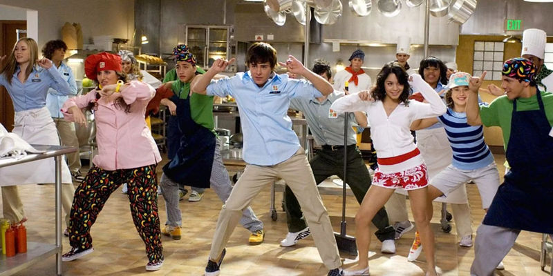 The cast of High School Musical 2 dancing in the kitchen during Work It Out.