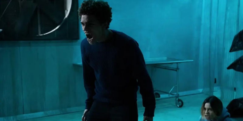 A boy and a girl turning into werewolves in Wolf Pack