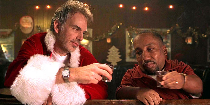 Billy Bob Thornton and Tony Cox as Willie and Marcus having a drink in Bad Santa