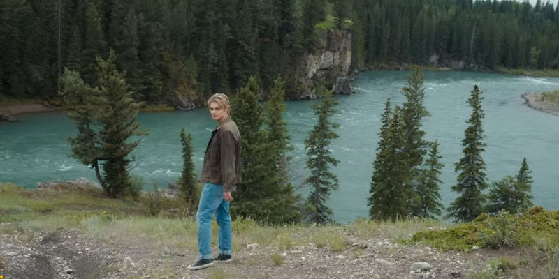 Cole (Noah LaLonde) looking back in nature in My Life with the Walter Boys