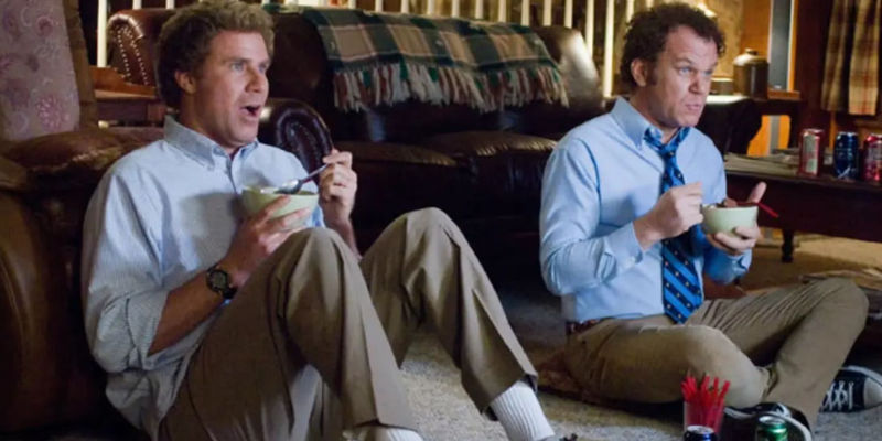 Will Ferrell as Brennan Huff and John C Riley as Dale Doback eating cereal and watching TV in Step Brothers