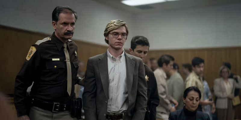 Evan Peters as Jeffrey Dahmer is led into the courtroom from Monster: The Jeffry Dahmer Story
