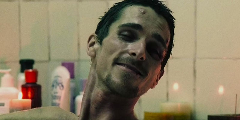 Christian Bale smiling in The Machinist