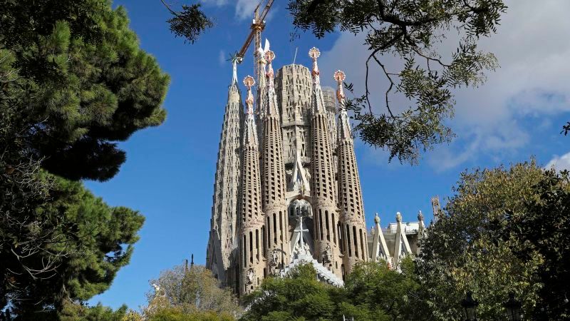 Barcelona's Iconic Sagrada Familia Cathedral Shines as Final Evangelist Towers Grace the Skyline