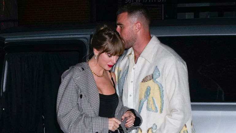 Taylor Swift Shares Intimate Moment with Travis Kelce, Paying Tribute with a Romantic Kiss
