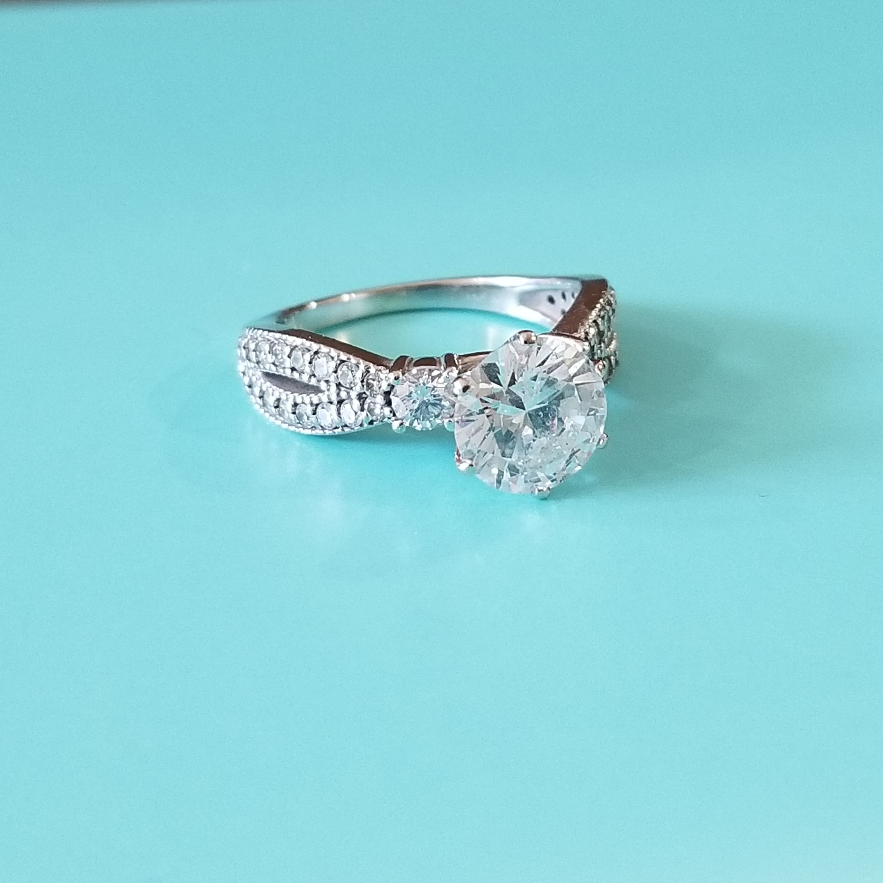 Side Stone Engagement Ring