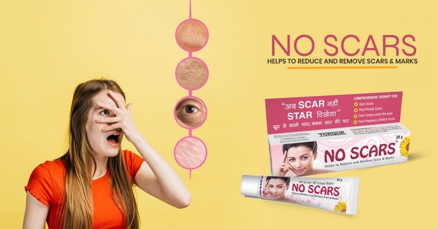 Applying the cream for scars to the face 