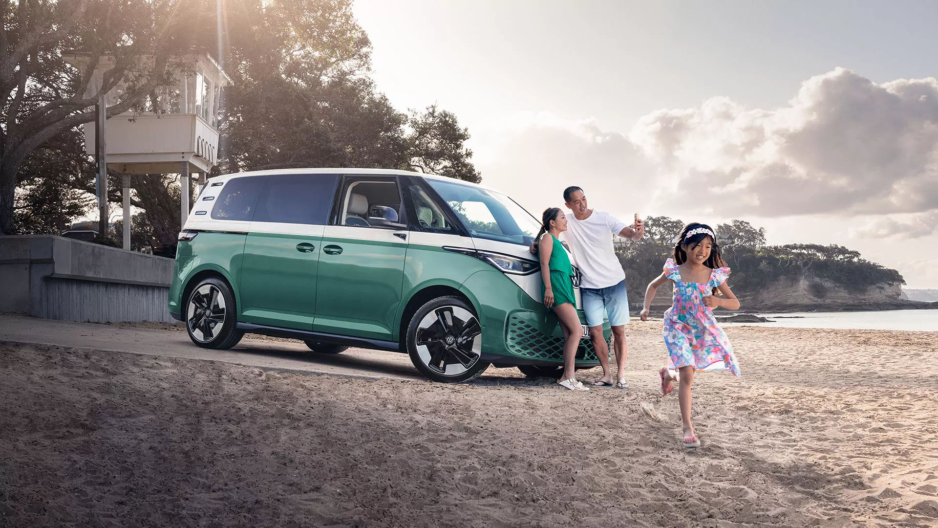 Volkswagen ID Buzz and family at the beach