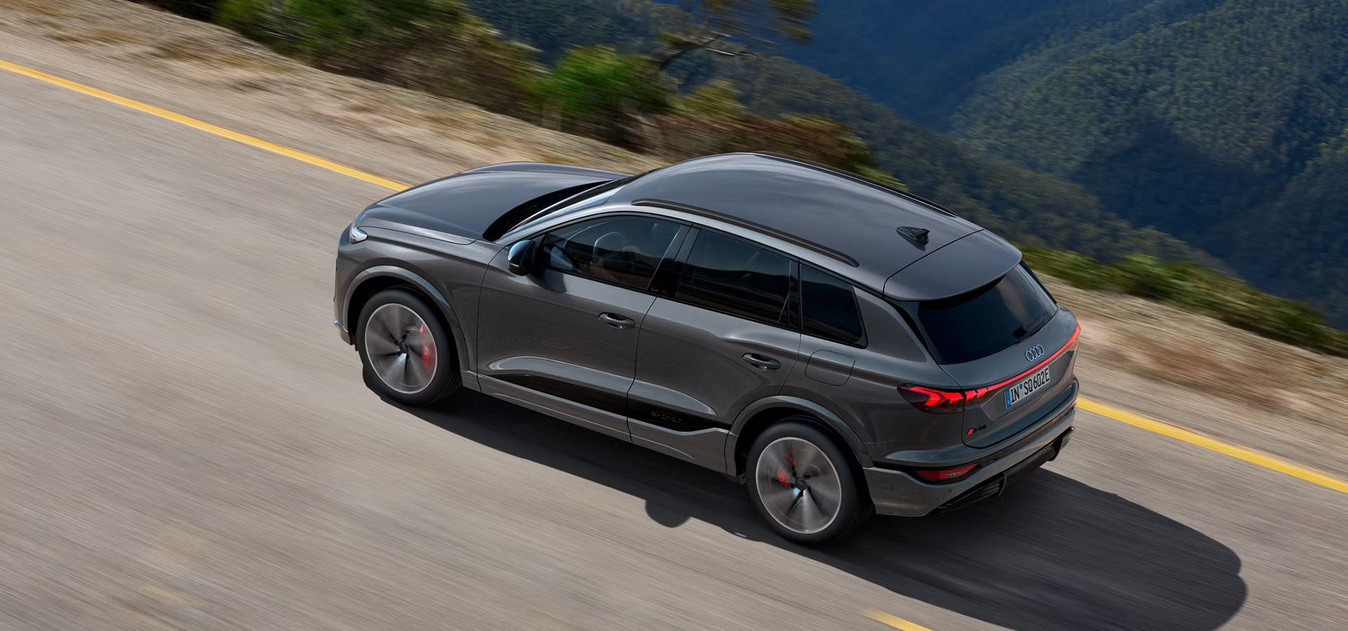 SQ6 e-tron driving along the road