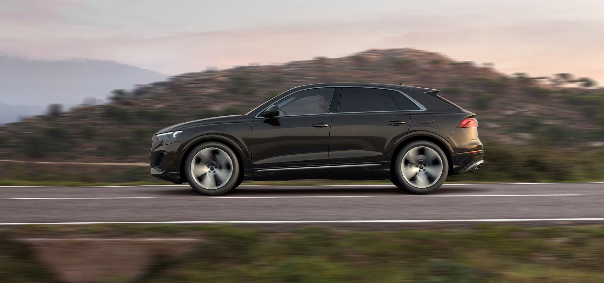 Q8 hybrid side view driving