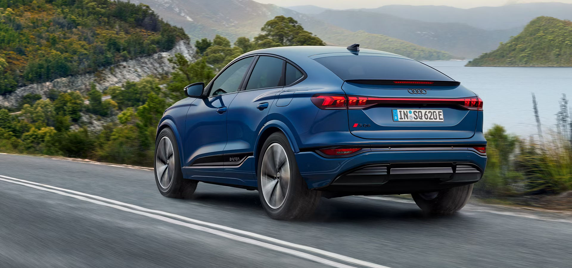 SQ6 e-tron Sportback driving along the road
