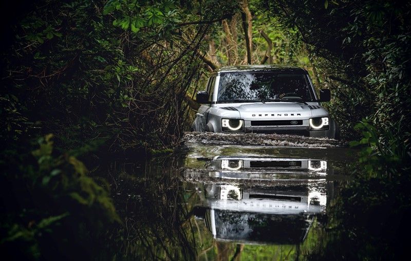 Defender wading through deep water