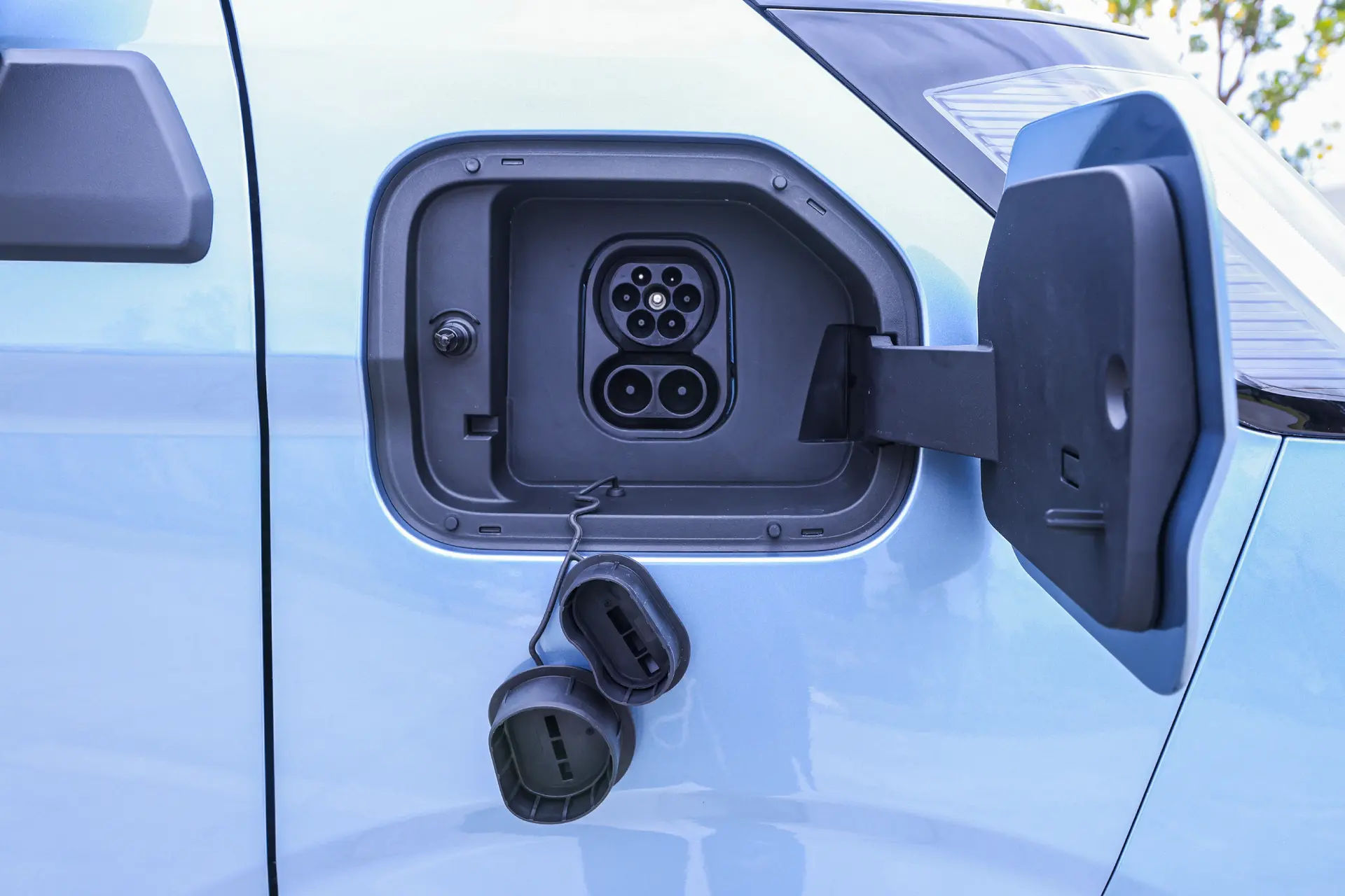 Farizon V7E van side charging flap open showing charging port