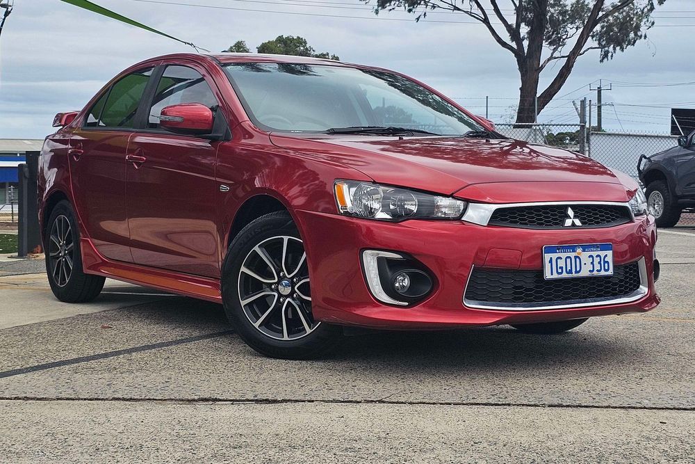 Comparing a Mitsubishi Lancer ES Sport to a Ford Ranger PHEV Wildtrak.