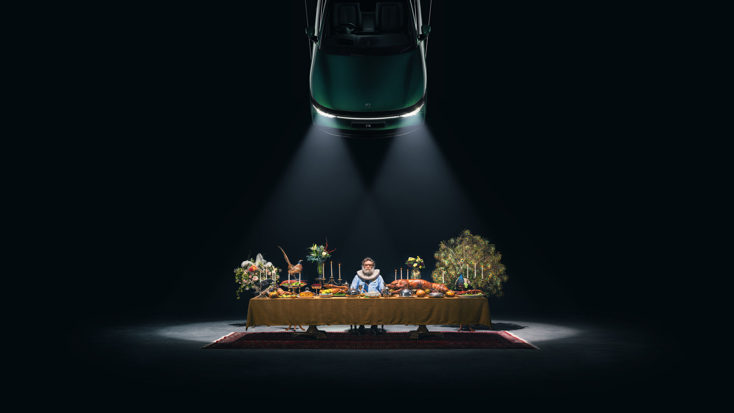 Feast — one of seven scenes built and photographed by hand for the ZEEKR and Taika Waititi Spotlight exhibition, lit by a suspended ZEEKR 7X.