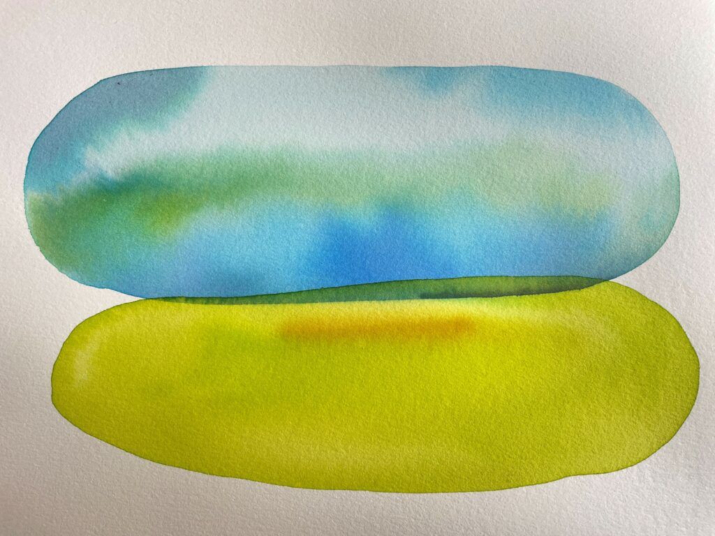Deux taches d'aquarelle de couleurs bleu et vert se rejoignent à l'horizontale.