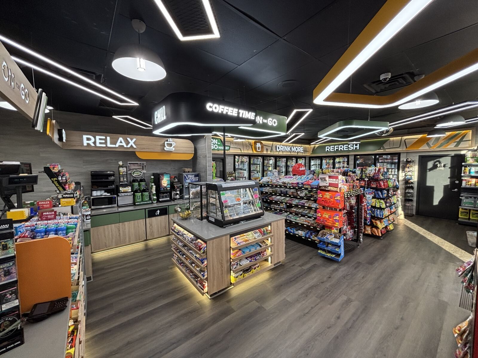 On the Go Market convenience store design with modern retail countertops and shelving - Beacon New York by TLines