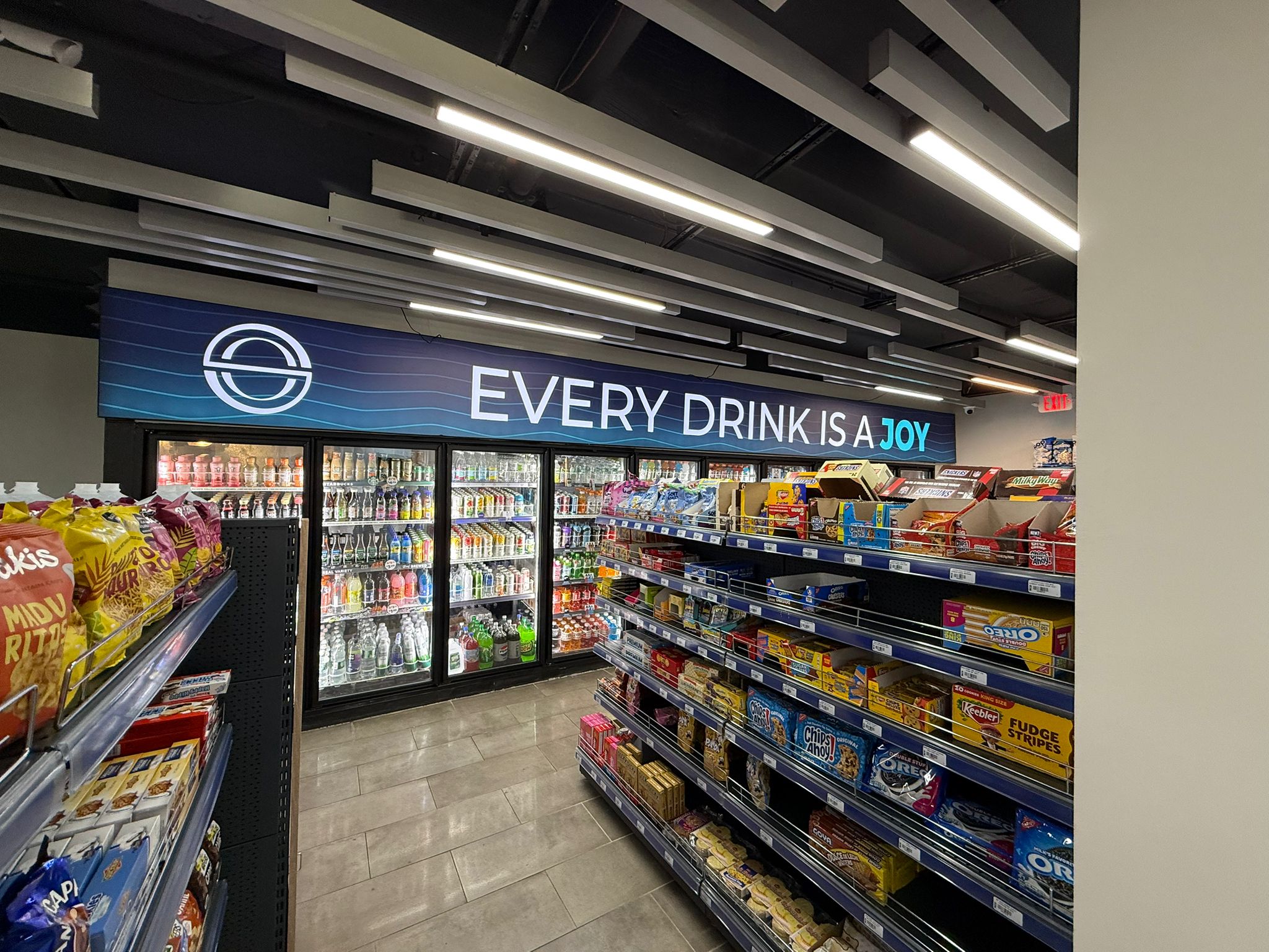 On the Go Market convenience store design with modern retail countertops and shelving - Beacon New York by TLines