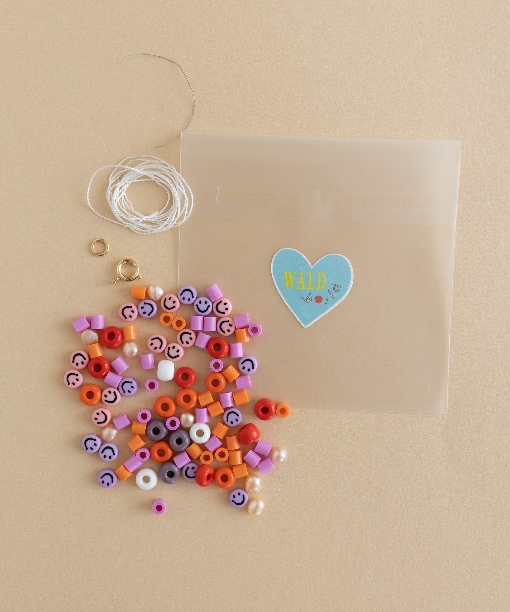 A DIY Candyman Kit Rose bag with beaded jewelry accents.