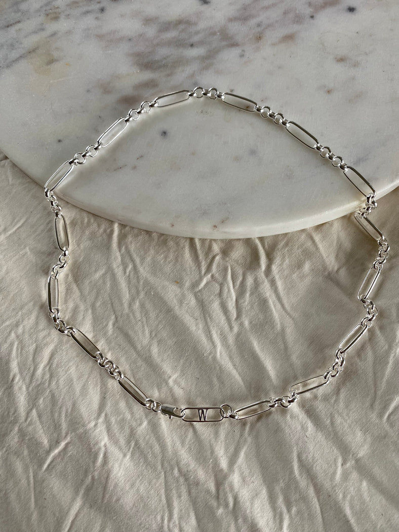 A Kim Necklace Silver by WALD Berlin on a marble table, Germany.