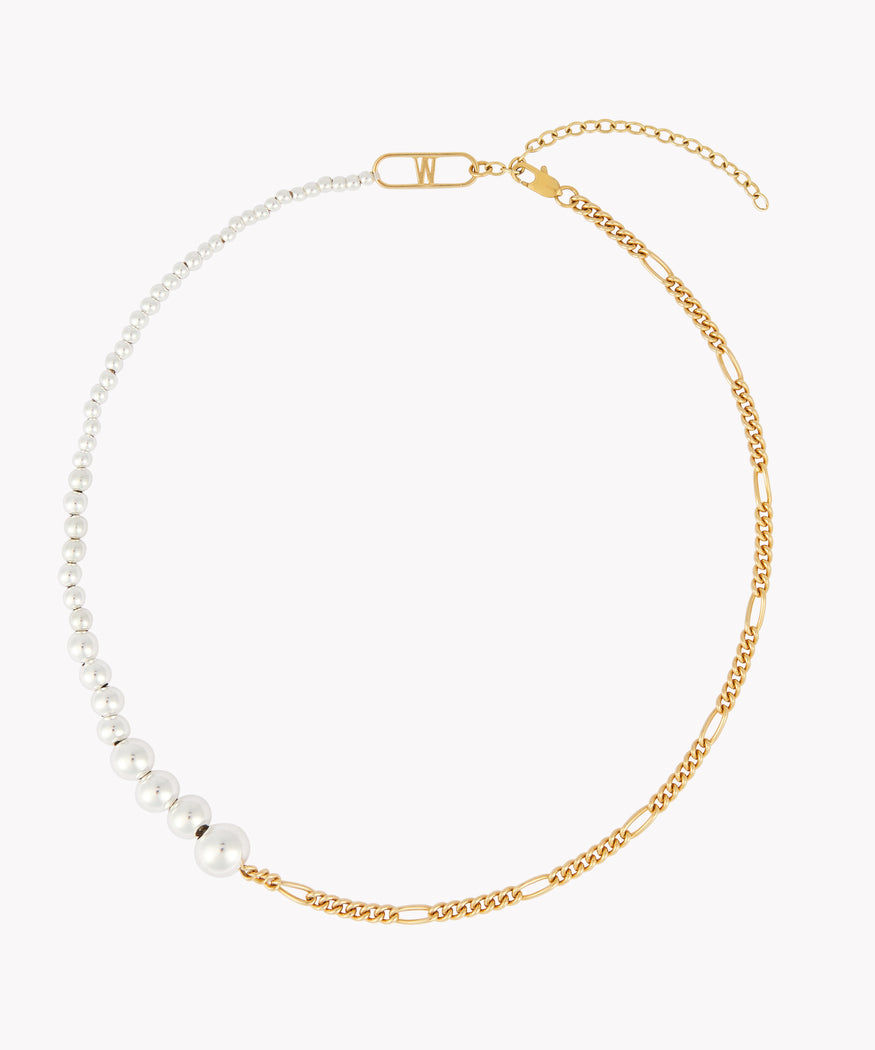 A NYC Pas De Deux Necklace from WALD Berlin, a German family-run business with a gold chain.