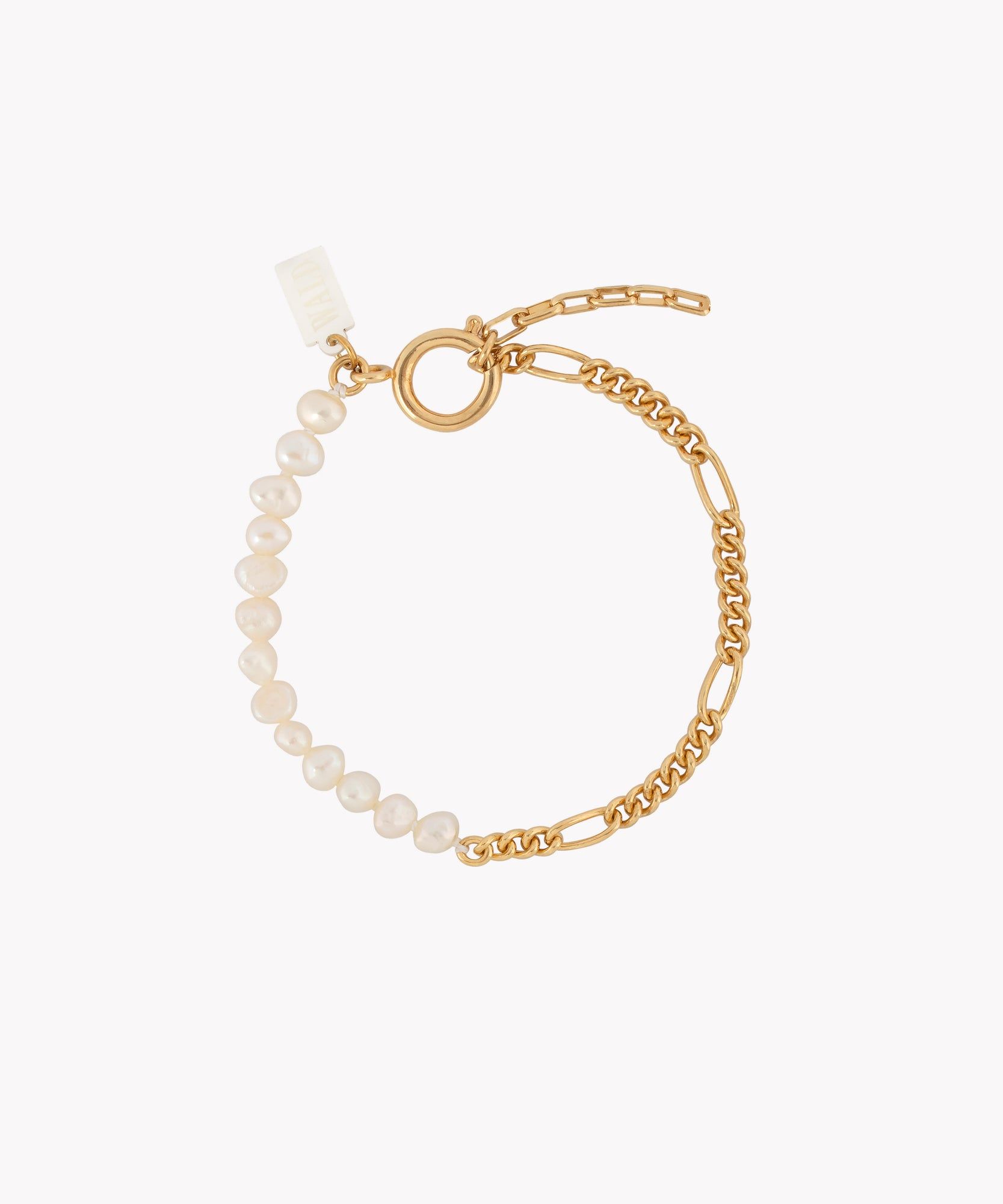 A Pas De Deux Bracelet handmade with pearls and a chain, by WALD Berlin.