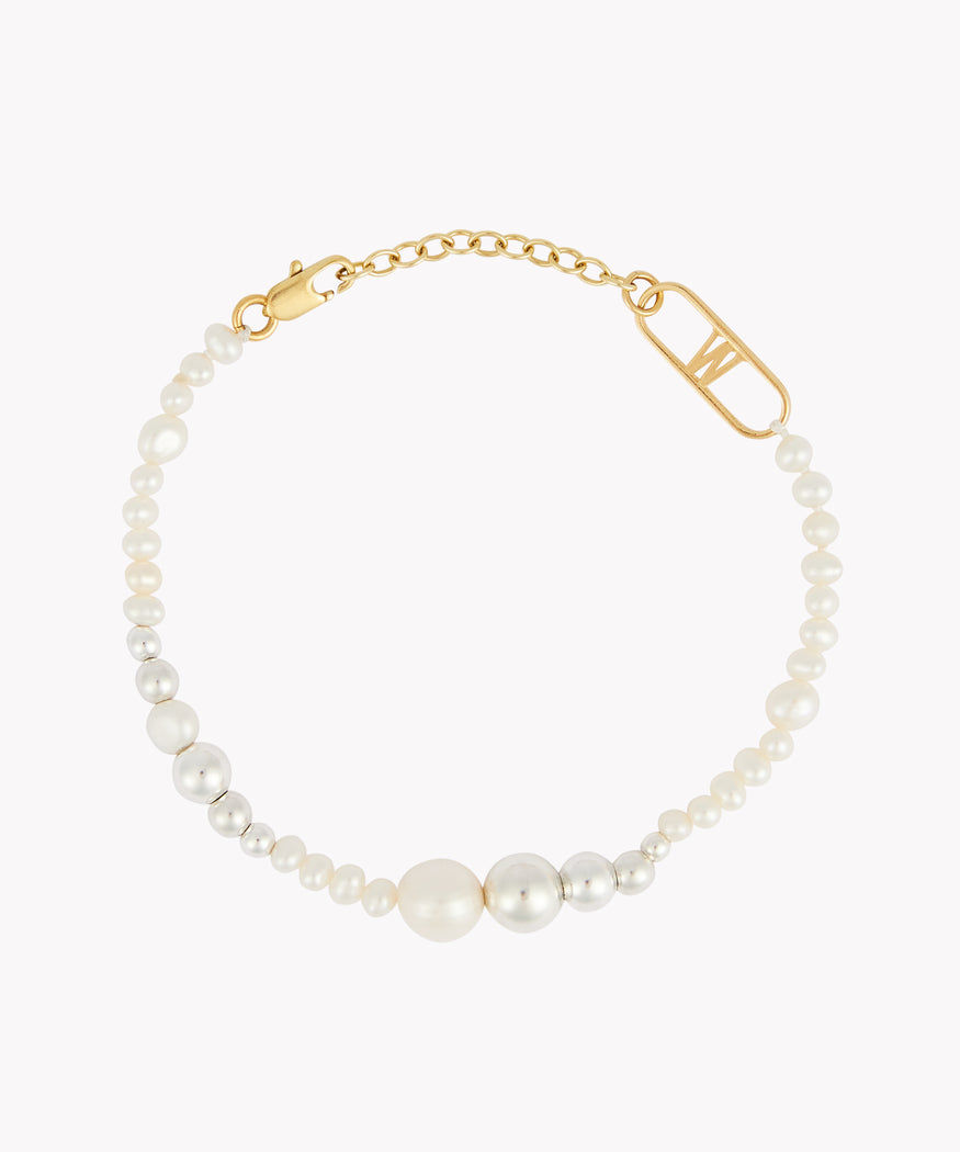 A WALD Berlin NYC State of Mind Bracelet with pearls and a gold clasp.