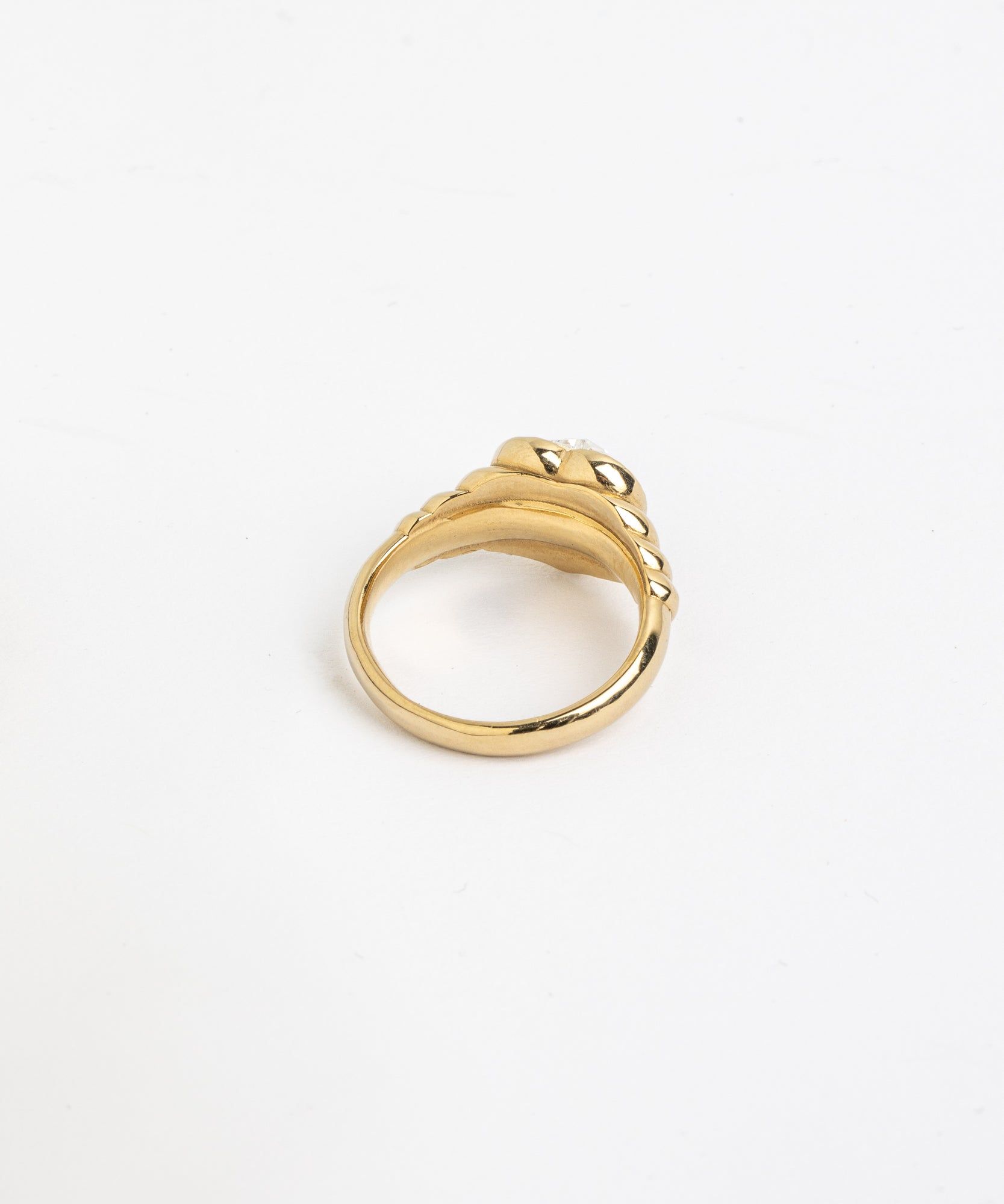 A Be My Lover Gold Ring by WALD Berlin, with a black stone, symbolizing self-love.