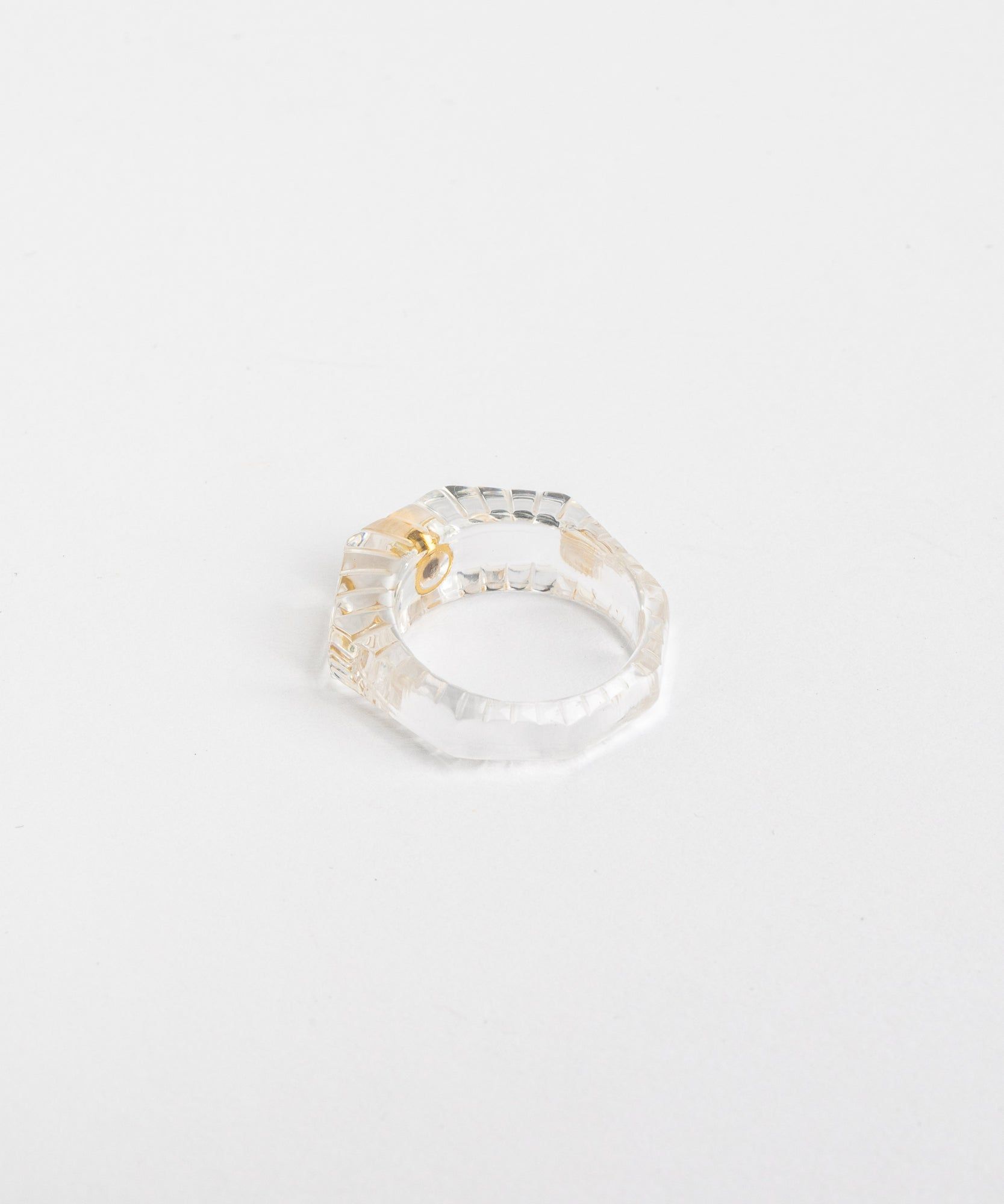 A German crystal ring by WALD Berlin on a white surface.