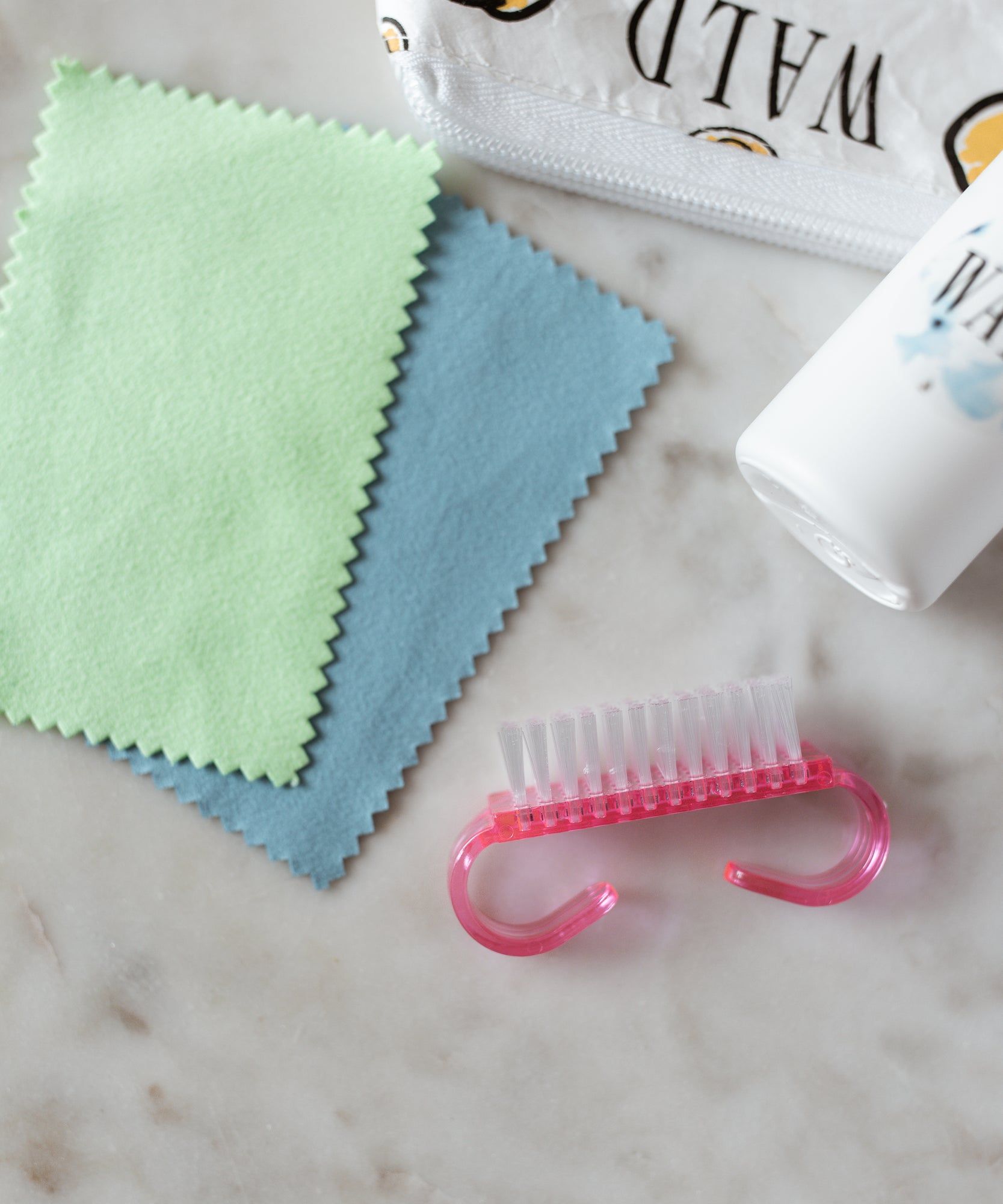 A WALD Berlin Cleaning Set and a toothbrush placed on a table in Germany.