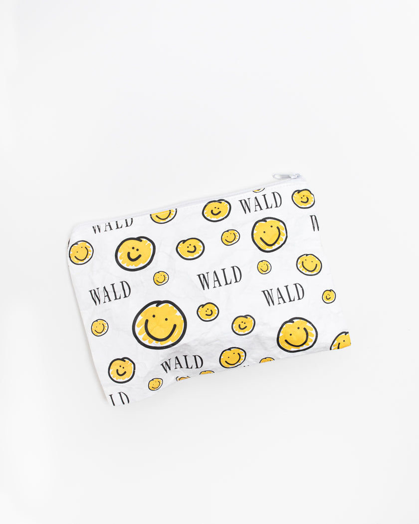 A yellow Smilie Dude Pouch made in Berlin, Germany by WALD Berlin.