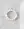 The Mother Of Pearl Multi Heart Bracelet by WALD Berlin, featuring large white beads and small heart-shaped charms, is arranged in a circle on a light marble surface.