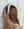 The back of a woman wearing the WALD Berlin Classic Light Blue Velvet Headband.