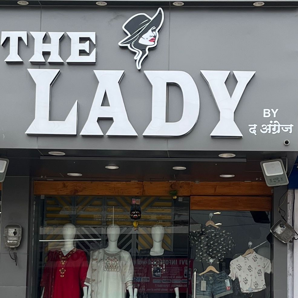 The Lady by The Angrej Logo