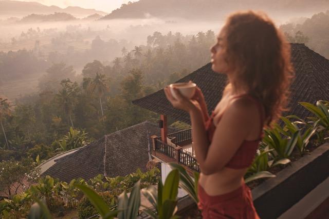 Woman Yoga Retreat at a Beautiful Bali Resort with Stunning Sunrise and Volcano Views