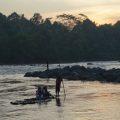Enjoying Sunset on Traditional Bamboo Boats in Sambeng Village Medium