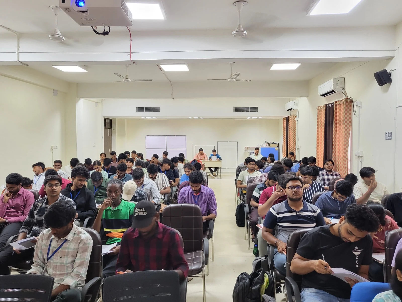 Packed classroom of learners during a drone session