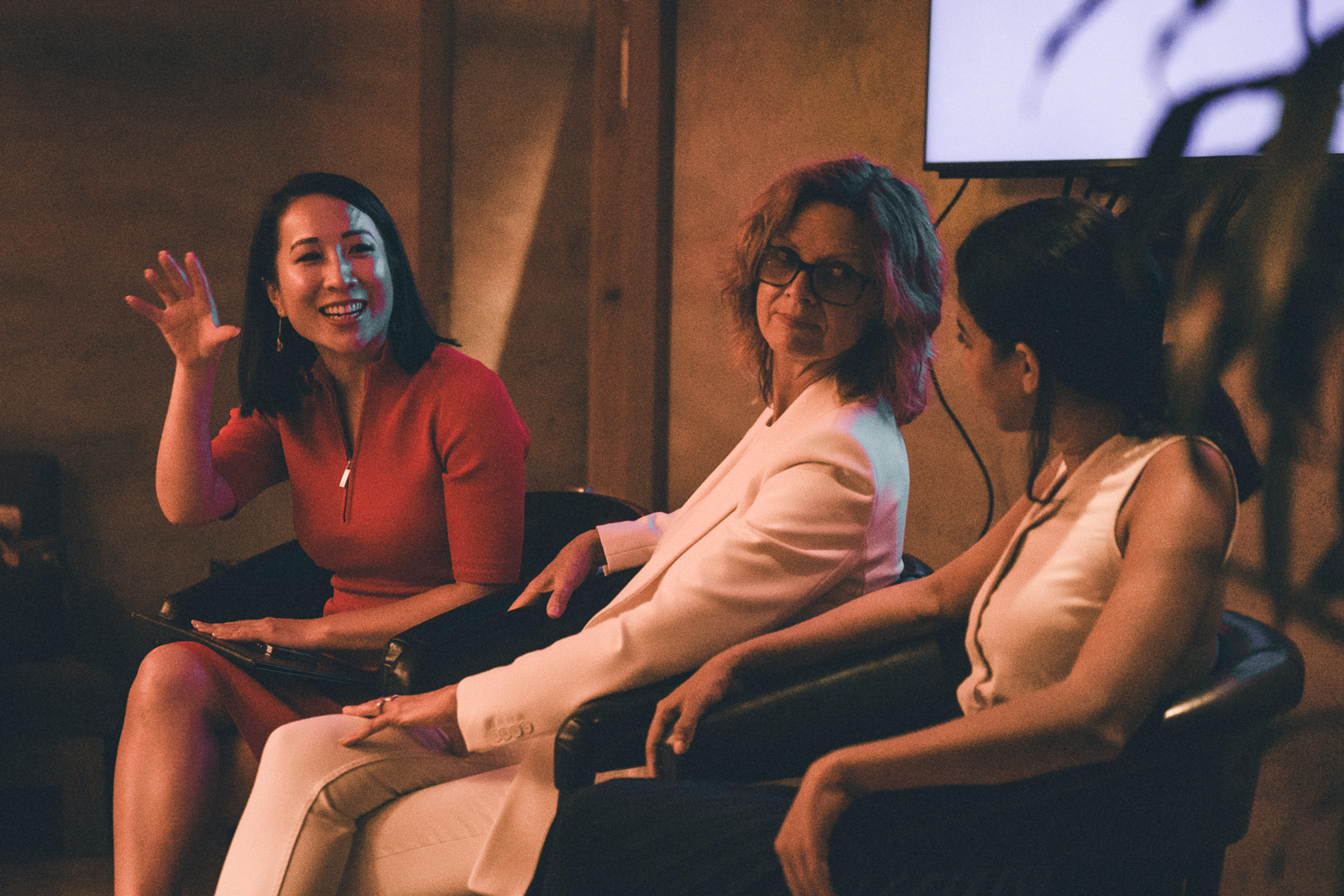 Image 6: A photo of Cathryn Chen addressing the guests, with a focus on her expressive and passionate delivery.