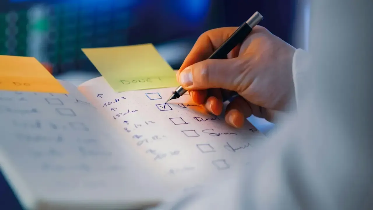 Web design checklist on a notepad
