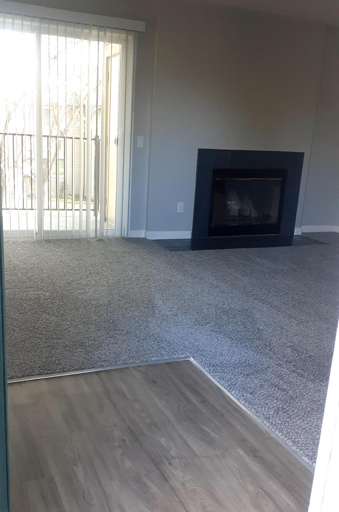 Entryway into Livingroom w/Fireplace