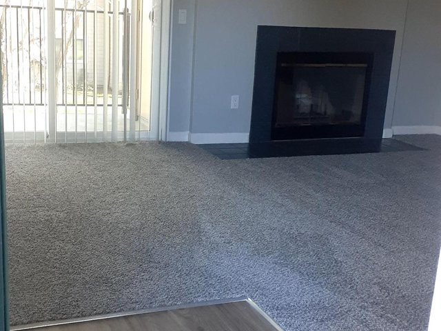 Entryway into Livingroom w/Fireplace