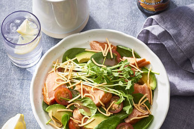 Salmon avocado and fried noodle salad