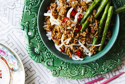 Chinese-style stir fry pork and noodles with snake beans